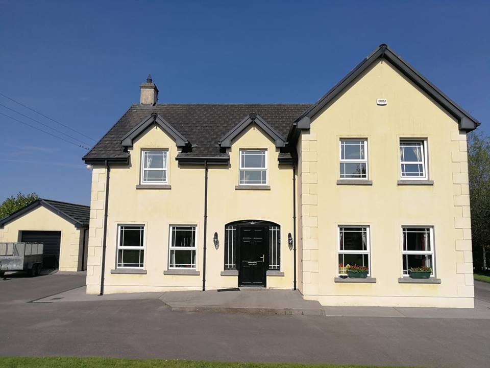 House that has been cleaned by soft washing and using chemicals to prevent mold recurring