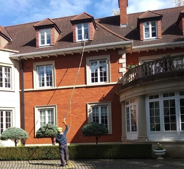 best window cleaner Meath in action cleaning a large building