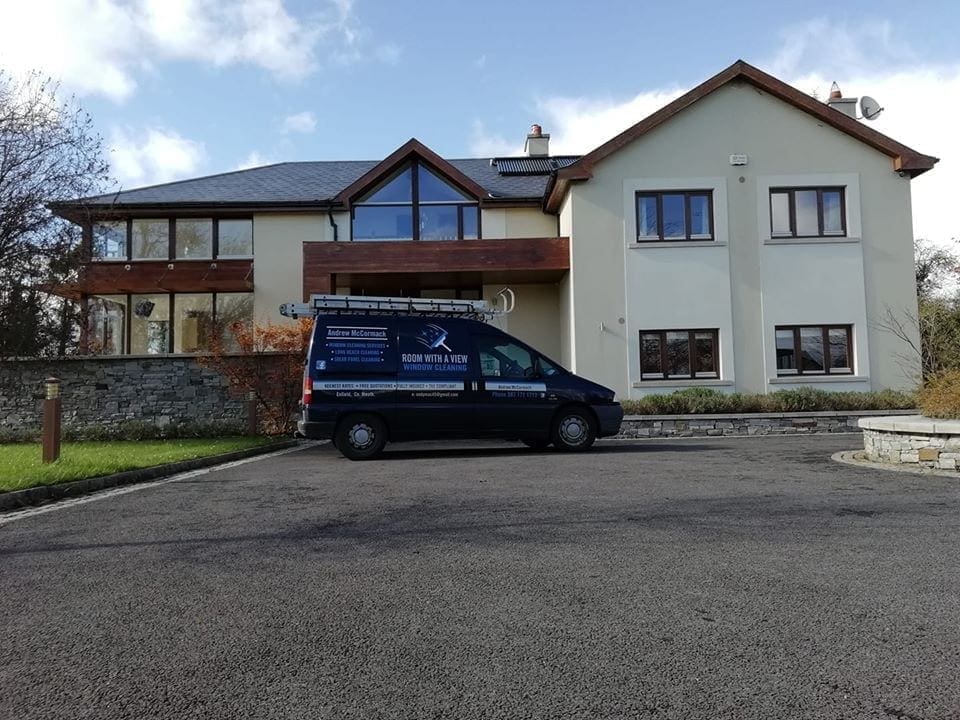 Shining glass windows on a house after we cleaned this beautiful modern house - Room with a view window cleaning professionals