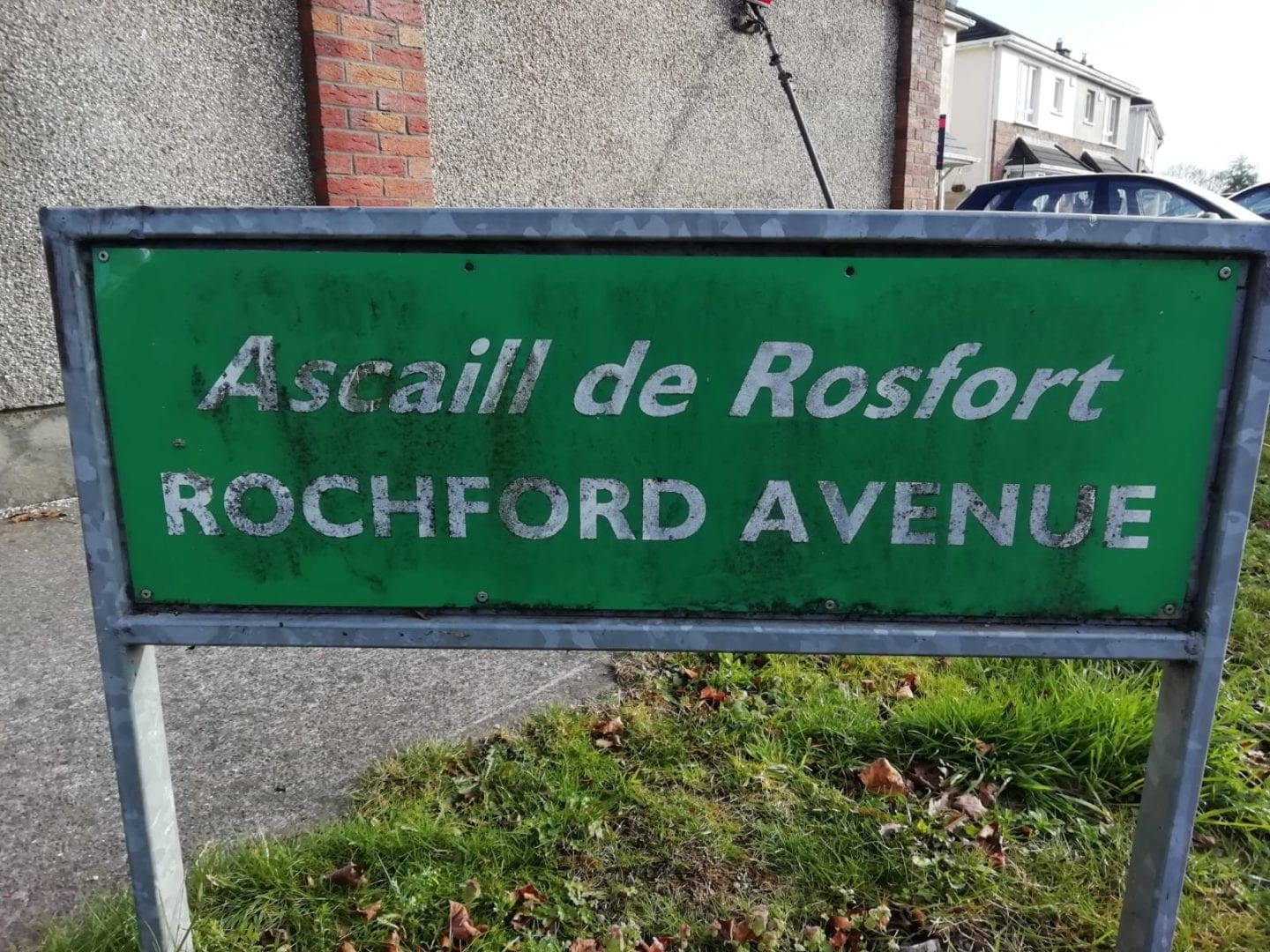 Sign for Rochford Bridge before cleaning covered in grime and dirt