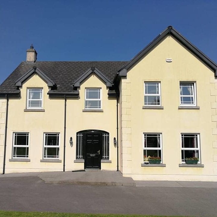 House that has been cleaned by soft washing and using chemicals to prevent mold recurring